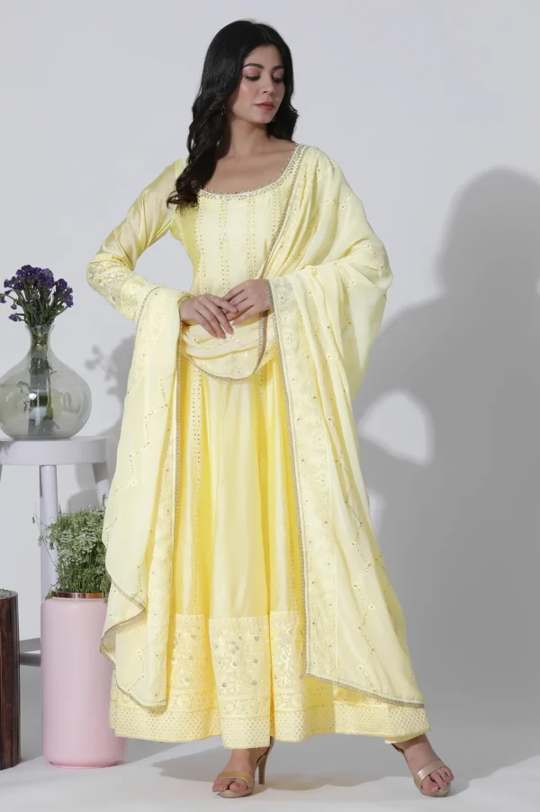 yellow chanderi panelled thread work anarkali kurta, churidar and dupatta set